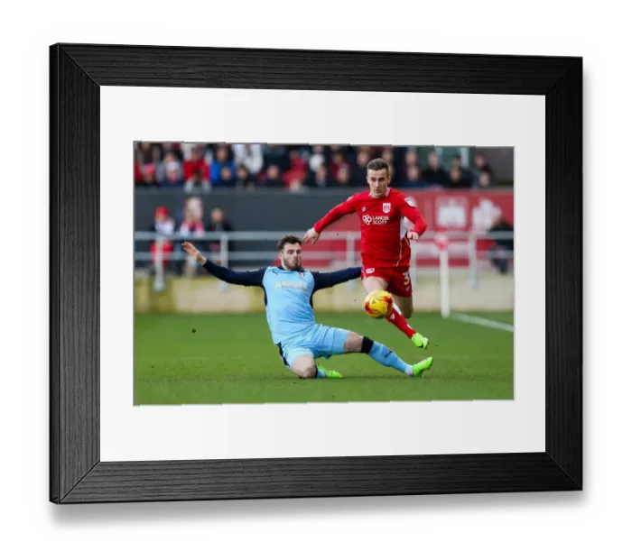 Framed Print : Intense Moment: Joe Bryan vs. Anthony Forde - A Hard-Fought Tackle in Bristol City vs. Rotherham United