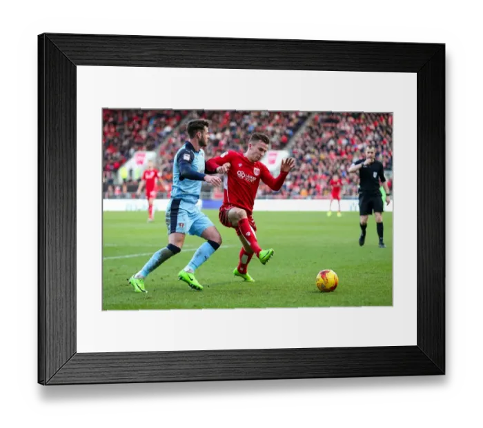 Framed Print : Bristol City vs Rotherham United: A Clash Between Joe Bryan and Anthony Forde Framed Print : Bristol City vs Rotherham United: A Clash Between Joe Bryan and Anthony Forde