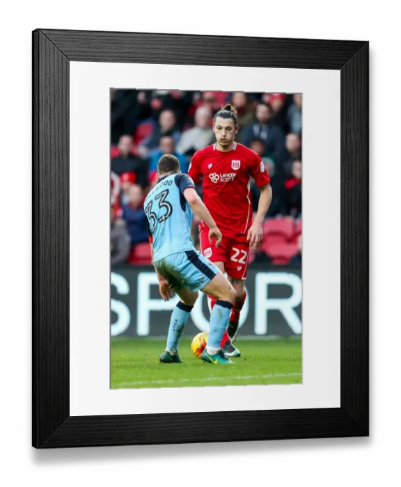 Framed Print : Milan Djuric vs Richard Smallwood: Clash in Sky Bet Championship Match at Ashton Gate Stadium Framed Print : Milan Djuric vs Richard Smallwood: Clash in Sky Bet Championship Match at Ashton Gate Stadium