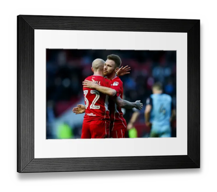 Framed Print : Bristol City's New Signings Cotterill and Taylor Celebrate 1-0 Win Over Rotherham United