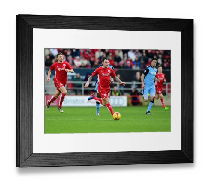 Framed Print : Bristol City's Lee Tomlin Drives Forward Against Rotherham United in Sky Bet Championship Match Framed Print : Bristol City's Lee Tomlin Drives Forward Against Rotherham United in Sky Bet Championship Match
