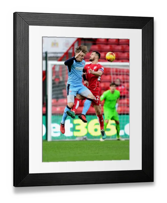 Framed Print : Intense Aerial Clash: Bailey Wright vs. Danny Ward Framed Print : Intense Aerial Clash: Bailey Wright vs. Danny Ward