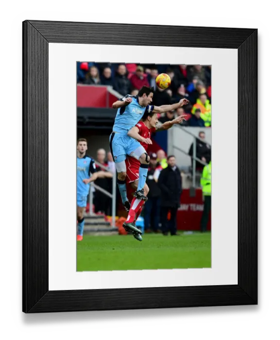 Framed Print : Aerial Clash: Milan Djuric vs. Richard Wood in Bristol City vs. Rotherham United