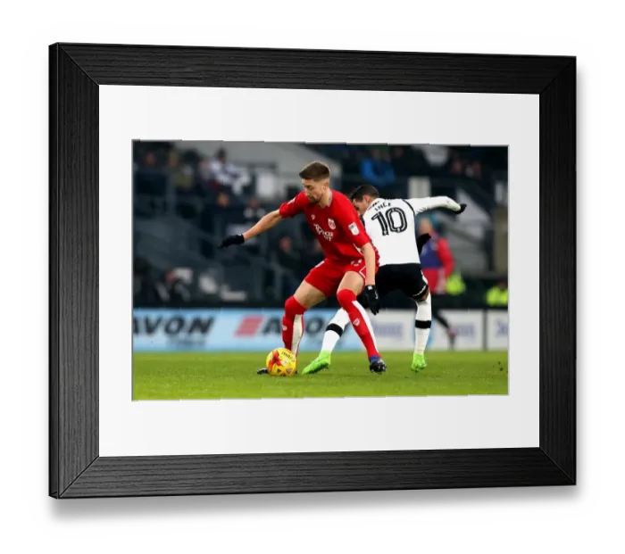 Framed Print : Bristol City's Jens Hegeler Dashes Past Derby County's Thomas Ince Framed Print : Bristol City's Jens Hegeler Dashes Past Derby County's Thomas Ince