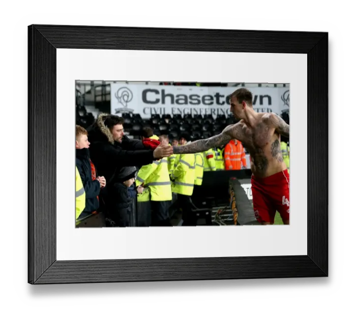 Framed Print : Aden Flint's Heartfelt Gesture: Giving His Shirt to a Fan at Derby County v Bristol City (11 / 02 / 2017)