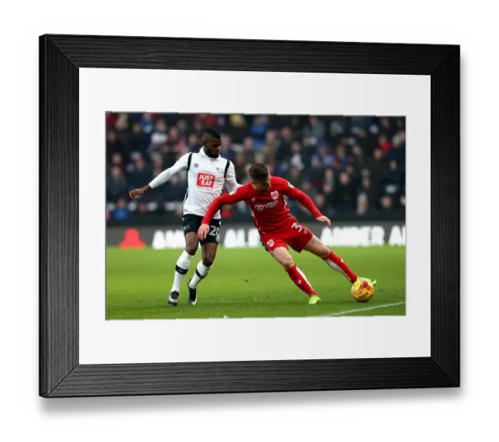 Framed Print : Bristol City's Joe Bryan Outmaneuvers Derby County's Abdoul Camara Framed Print : Bristol City's Joe Bryan Outmaneuvers Derby County's Abdoul Camara