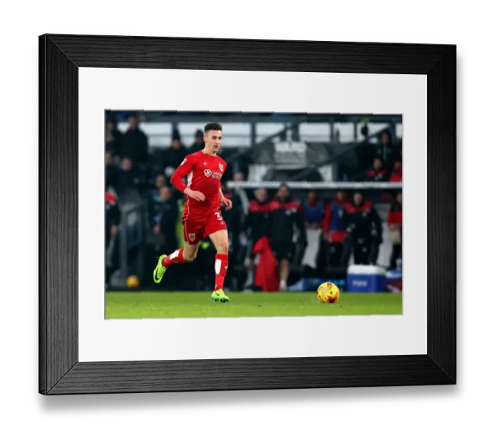 Framed Print : Bristol City's Joe Bryan Bolts Past Defenders in Derby County Showdown Framed Print : Bristol City's Joe Bryan Bolts Past Defenders in Derby County Showdown