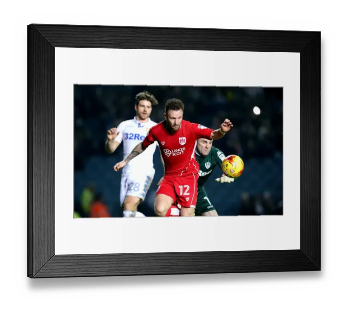 Framed Print : Matty Taylor Outmuscles Robert Green: A Pivotal Moment in Leeds United vs. Bristol City, 2017