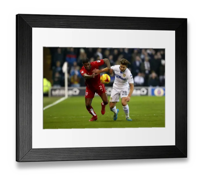 Framed Print : Battling for Supremacy: Mark Little vs. Gaetano Berardi in Leeds United vs. Bristol City Championship Clash Framed Print : Battling for Supremacy: Mark Little vs. Gaetano Berardi in Leeds United vs. Bristol City Championship Clash