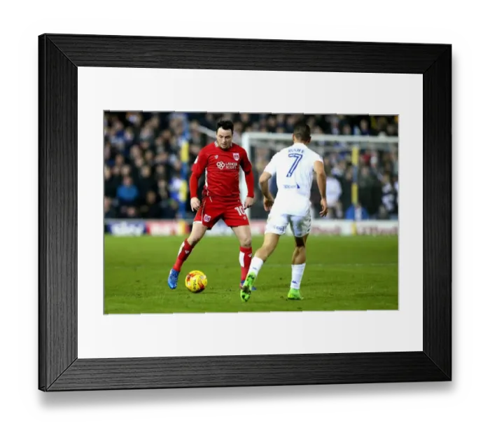 Framed Print : Leeds United vs. Bristol City: Lee Tomlin vs. Kemar Roofe Battle at Elland Road, Sky Bet Championship Framed Print : Leeds United vs. Bristol City: Lee Tomlin vs. Kemar Roofe Battle at Elland Road, Sky Bet Championship