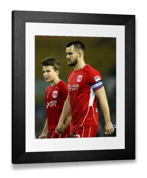 Framed Print : Bristol City's Bailey Wright and Mascot Prepare for Leeds United Clash at Elland Road, 14 / 02 / 2017 Framed Print : Bristol City's Bailey Wright and Mascot Prepare for Leeds United Clash at Elland Road, 14 / 02 / 2017