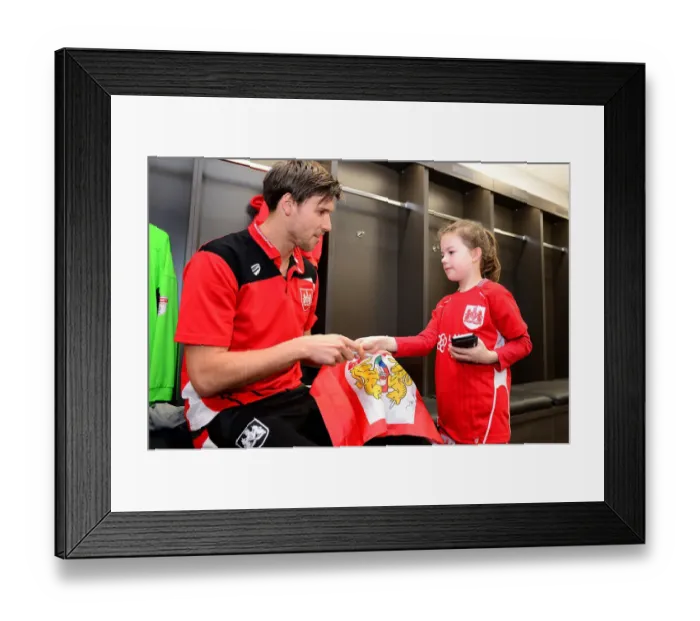 Framed Print : Bristol City's Fabian Giefer Signs Autographs for Mascot Before Fulham Match Framed Print : Bristol City's Fabian Giefer Signs Autographs for Mascot Before Fulham Match