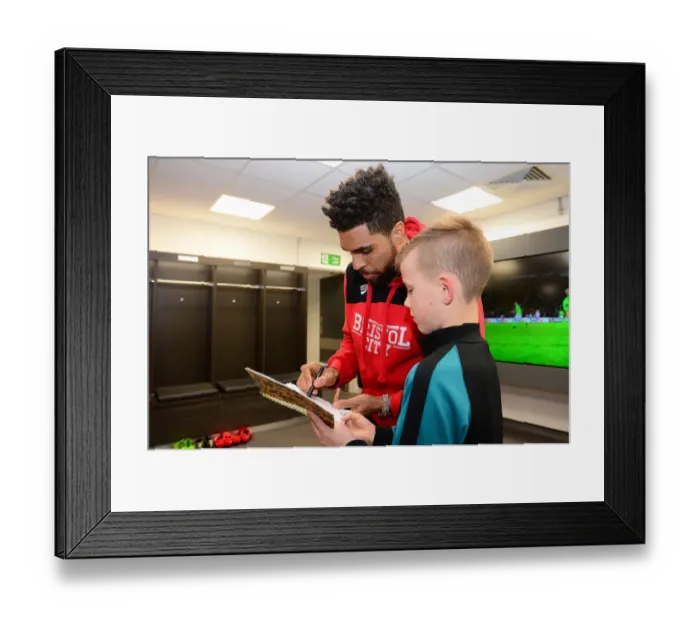 Framed Print : Bristol City's Scott Golbourne Signs Autographs for Mascot Before Fulham Match Framed Print : Bristol City's Scott Golbourne Signs Autographs for Mascot Before Fulham Match