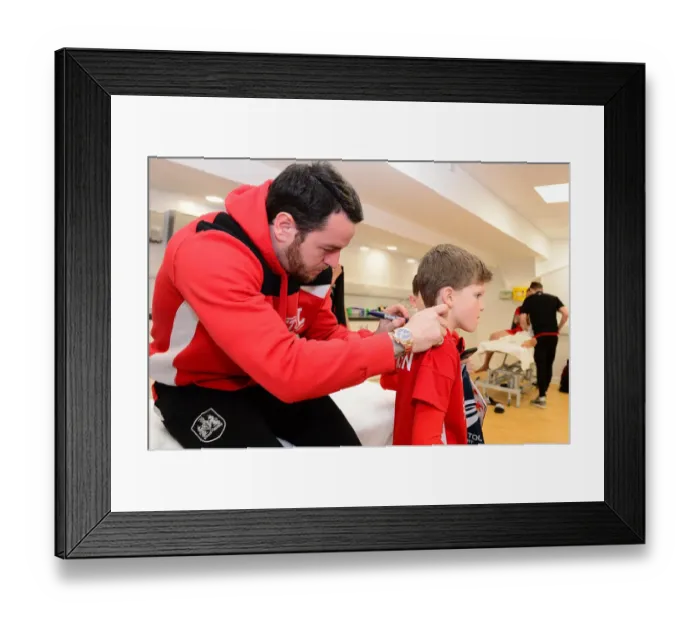 Framed Print : Bristol City's Lee Tomlin Signs Autographs for Mascot Before Fulham Match Framed Print : Bristol City's Lee Tomlin Signs Autographs for Mascot Before Fulham Match