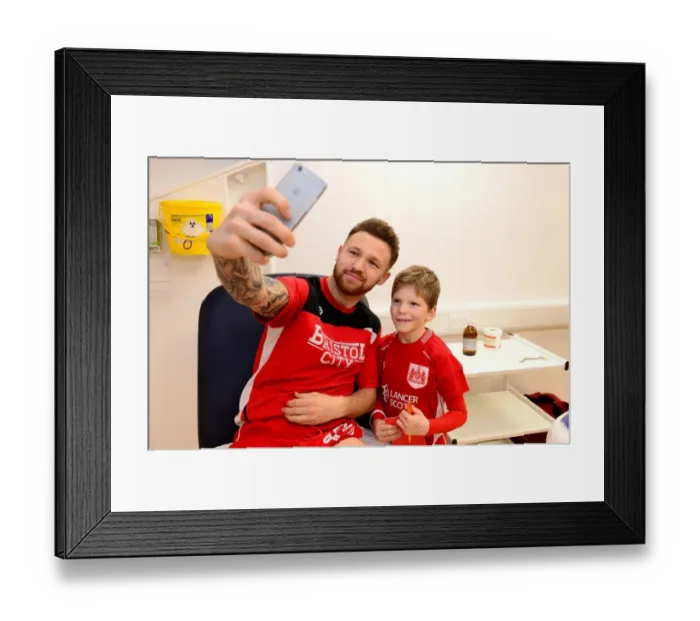 Framed Print : Bristol City's Matty Taylor Meets the Mascot Before Facing Fulham in 2017 Championship Match Framed Print : Bristol City's Matty Taylor Meets the Mascot Before Facing Fulham in 2017 Championship Match