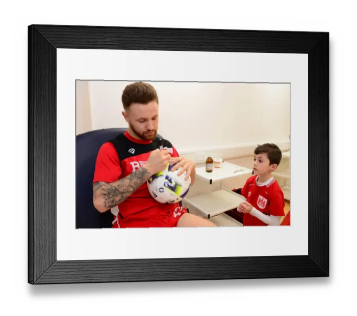 Framed Print : Matty Taylor Greets Mascot with Autographs Before Bristol City vs. Fulham Framed Print : Matty Taylor Greets Mascot with Autographs Before Bristol City vs. Fulham