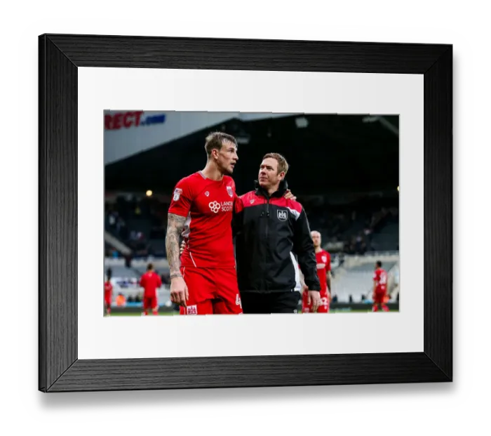 Framed Print : Aden Flint and Dean Holden of Bristol City Discuss 2-2 Draw with Newcastle United at St. James Park
