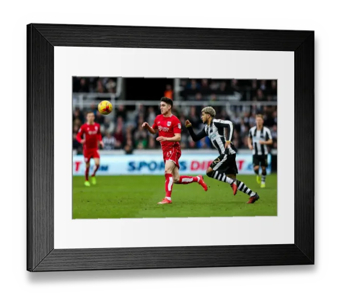 Framed Print : Clash at St. James Park: O'Dowda vs. Yedlin