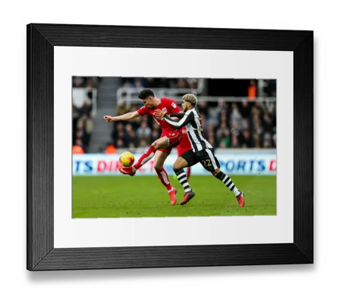 Framed Print : Yedlin vs. O'Dowda: A Championship Showdown at St. James Park