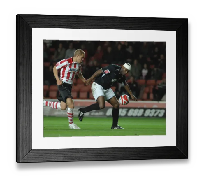 Framed Print : Dele Adebola runs through on goal Framed Print : Dele Adebola runs through on goal