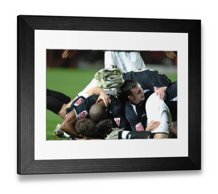 Framed Print : Lee Johnsons team mates pile on top to join the celebrations Framed Print : Lee Johnsons team mates pile on top to join the celebrations