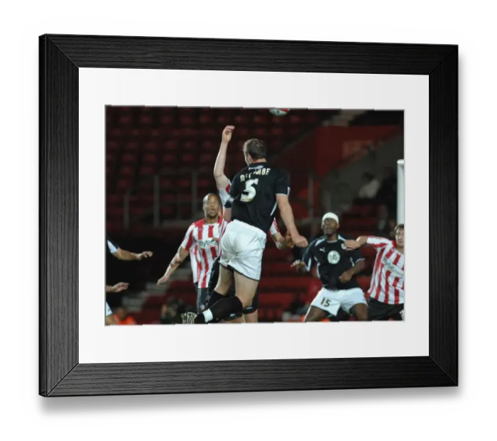 Framed Print : Jamie McCombes header hits the hand of defender alex pearce