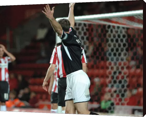 Jamie McCombe appeals for the penalty which