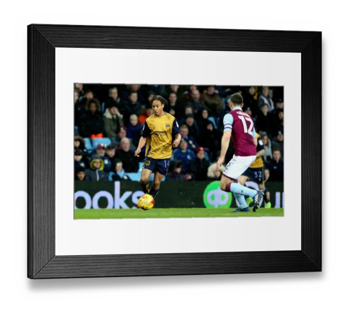 Framed Print : Bobby Reid Charges Forward: Aston Villa vs. Bristol City, Championship Clash (February 2017)