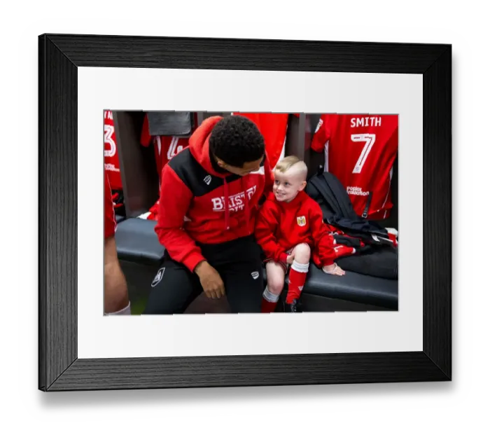 Framed Print : Bristol City Mascots and Players Unite in the Dressing Room Framed Print : Bristol City Mascots and Players Unite in the Dressing Room