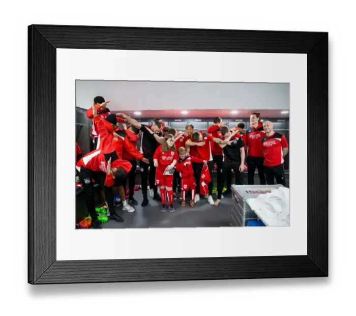 Framed Print : Bristol City Mascots and Players Unite in the Dressing Room Framed Print : Bristol City Mascots and Players Unite in the Dressing Room