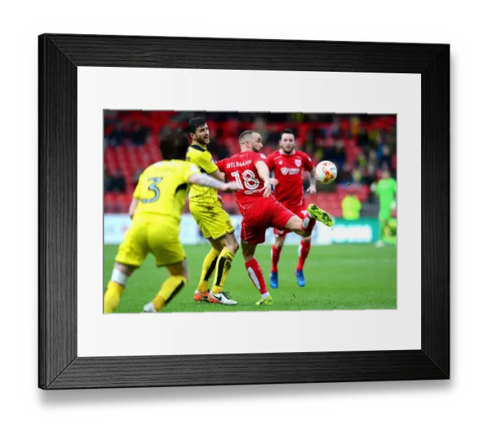 Framed Print : Bristol City's Wilbraham Fends Off Burton's Mousinho in Championship Clash