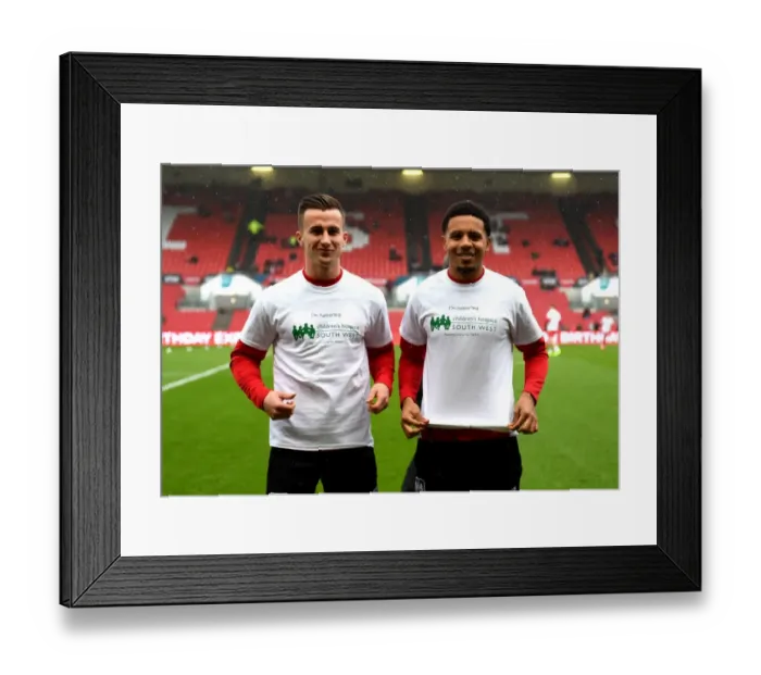 Framed Print : Bristol City Footballers Joe Bryan and Korey Smith Display Children's Hospice South West Support Shirts vs Burton Albion (04 / 03 / 2017) Framed Print : Bristol City Footballers Joe Bryan and Korey Smith Display Children's Hospice South West Support Shirts vs Burton Albion (04 / 03 / 2017)