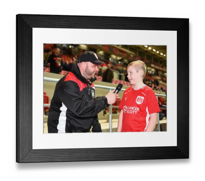 Framed Print : Bristol City Mascot Interviewed by Announcer Ian Downs Before Face-Off Against Norwich City at Ashton Gate