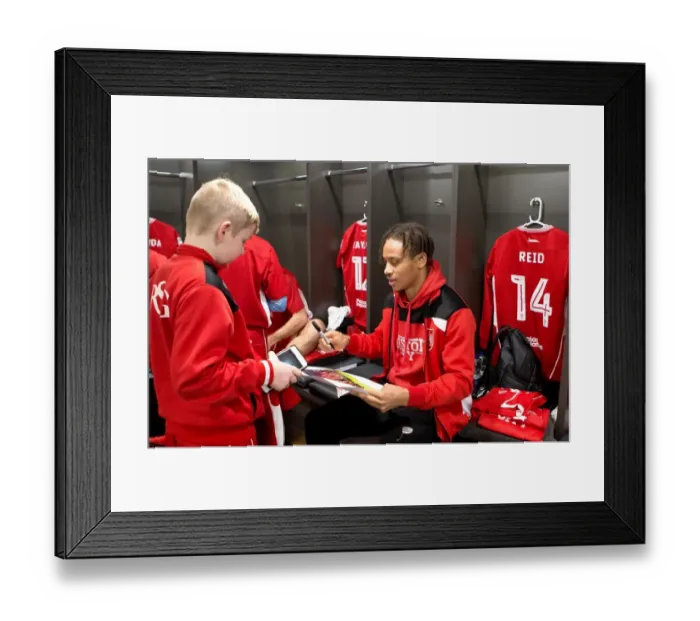 Framed Print : Bristol City Football Club: Mascots and Players Unite in the Dressing Room
