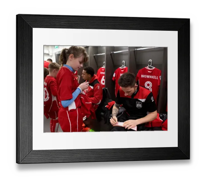 Framed Print : United in Preparation: A Sneak Peek into the Bristol City Dressing Room with Mascots and Players before the Norwich City Match, 2017