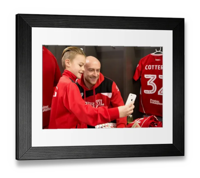 Framed Print : Bristol City: Mascots and Players Unite in the Dressing Room
