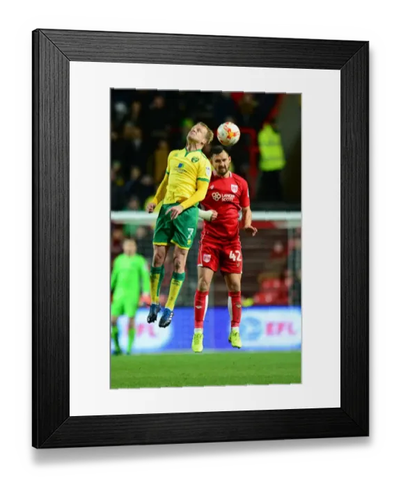 Framed Print : Bristol City vs. Norwich City: Intense Aerial Battle Between Bailey Wright and Steven Naismith Framed Print : Bristol City vs. Norwich City: Intense Aerial Battle Between Bailey Wright and Steven Naismith