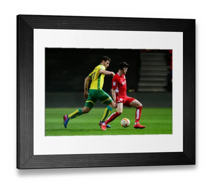 Framed Print : Bristol City vs Norwich City: Intense Battle for the Ball between Callum O'Dowda and Yanic Wildschut Framed Print : Bristol City vs Norwich City: Intense Battle for the Ball between Callum O'Dowda and Yanic Wildschut