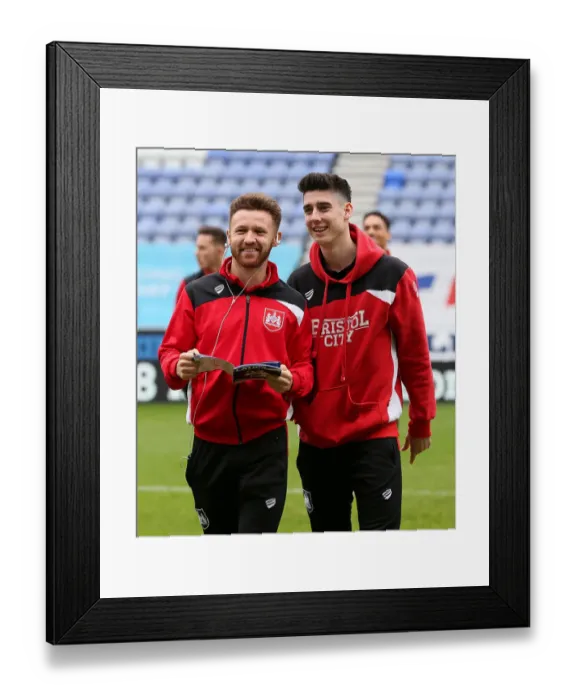 Framed Print : Bristol City FC: Matt Taylor and Callum O'Dowda Deep in Pre-Match Focus at Wigan Athletic's DW Stadium Framed Print : Bristol City FC: Matt Taylor and Callum O'Dowda Deep in Pre-Match Focus at Wigan Athletic's DW Stadium