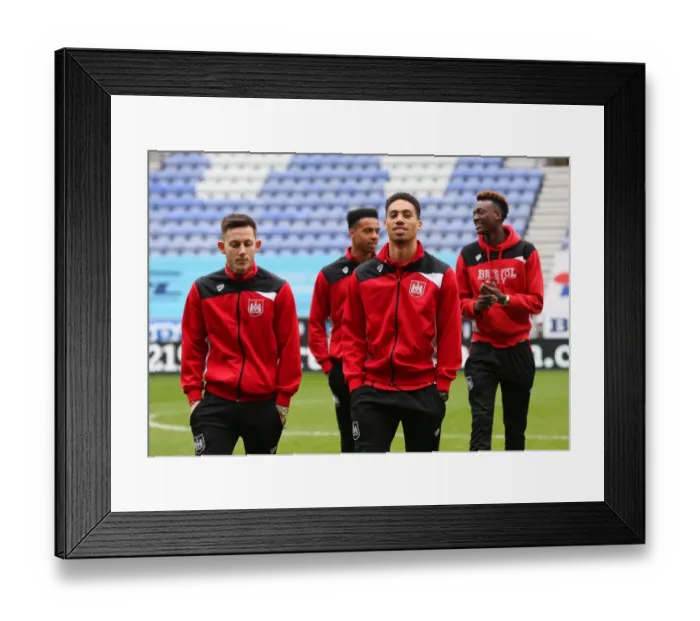 Framed Print : Bristol City Players Gather on Pitch Before Wigan Athletic Match, 11 March 2017