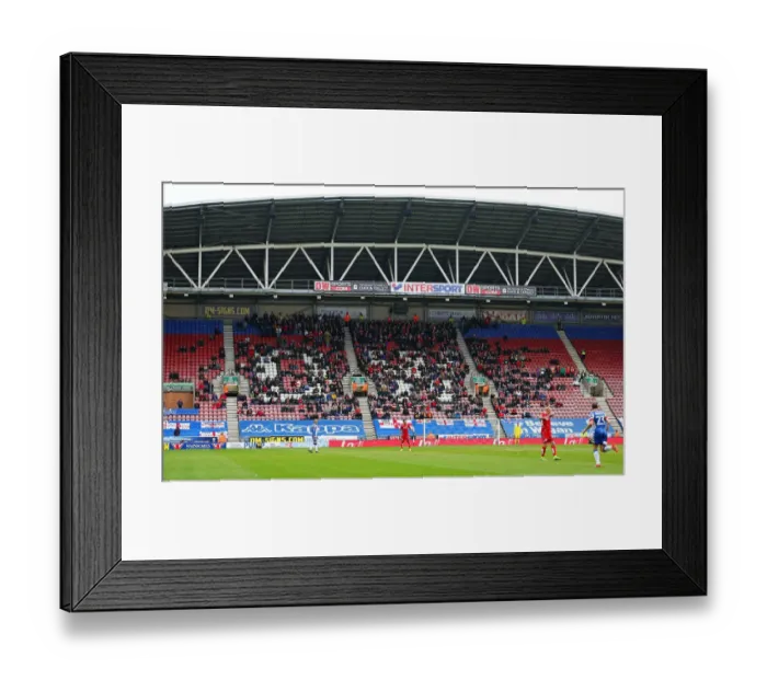 Framed Print : Bristol City Fans Rally at Wigan Athletic's DW Stadium during Sky Bet Championship Match Framed Print : Bristol City Fans Rally at Wigan Athletic's DW Stadium during Sky Bet Championship Match