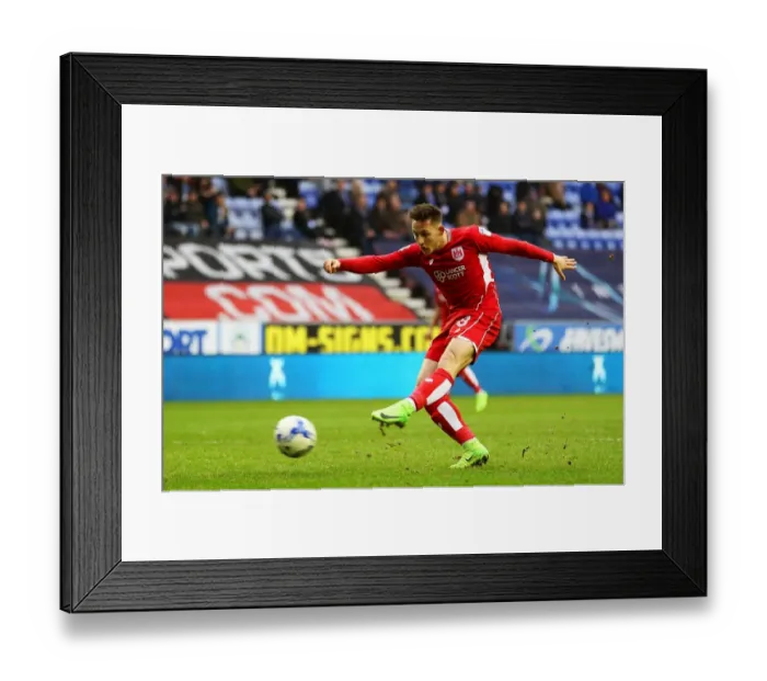 Framed Print : Bristol City's Josh Brownhill Unleashes a Shot at Wigan Athletic in Sky Bet Championship Clash