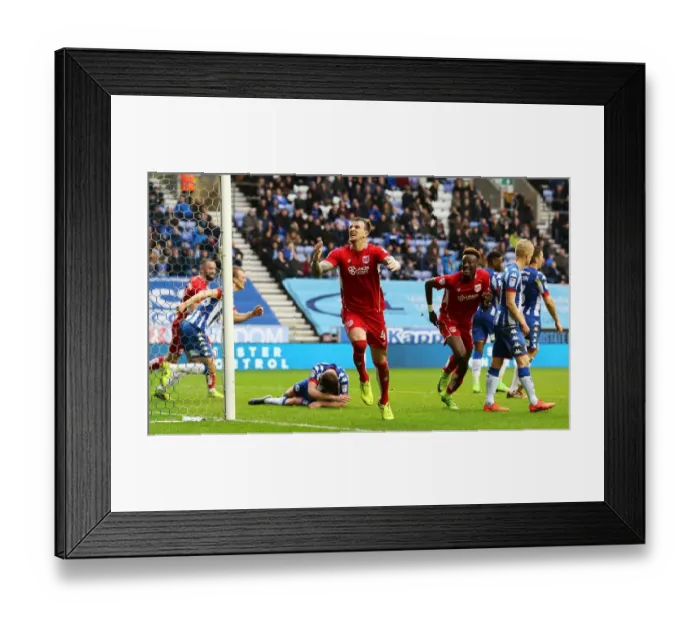 Framed Print : Bristol City's Aden Flint Scores Euphoric Goal, Stuns Wigan Athletic in Sky Bet Championship (March 11, 2017)