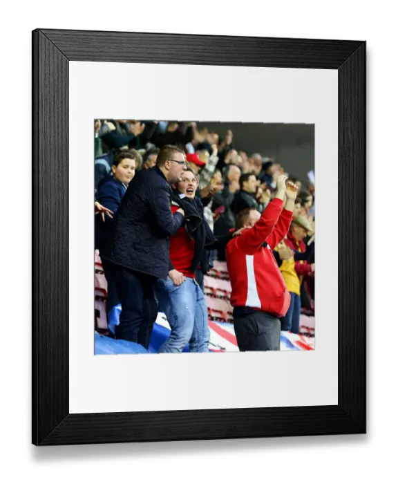Framed Print : Unwavering Passion of Bristol City Fans at Wigan Athletic's Championship Match, March 2017 Framed Print : Unwavering Passion of Bristol City Fans at Wigan Athletic's Championship Match, March 2017