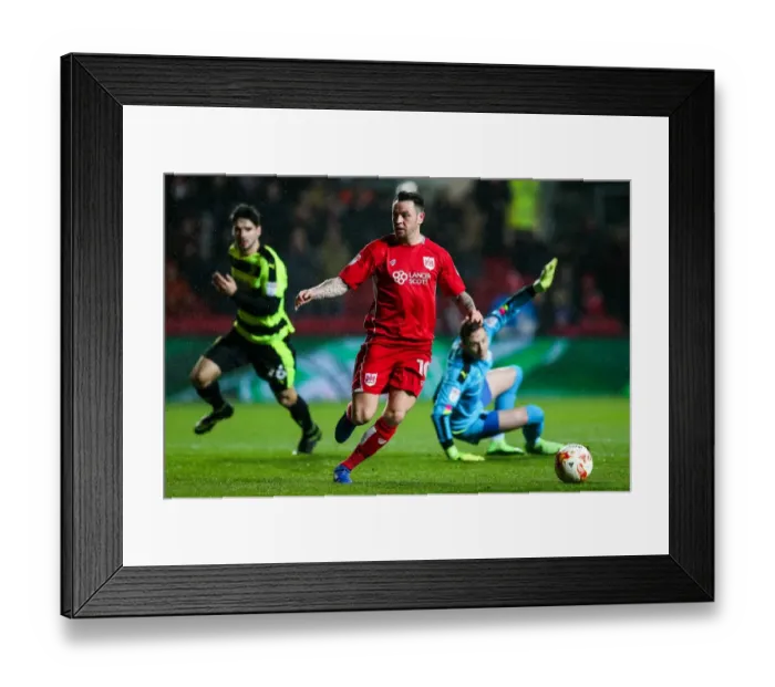 Framed Print : Bristol City Takes Early Lead: Lee Tomlin's Stunning Goal vs. Huddersfield Town