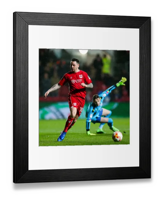 Framed Print : Lee Tomlin's Stunning Goal: Bristol City Takes Early Lead Against Huddersfield Town Framed Print : Lee Tomlin's Stunning Goal: Bristol City Takes Early Lead Against Huddersfield Town