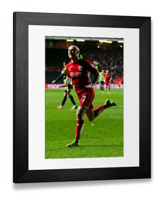 Framed Print : David Cotterill's Penalty Seals 4-0 Lead for Bristol City over Huddersfield Town