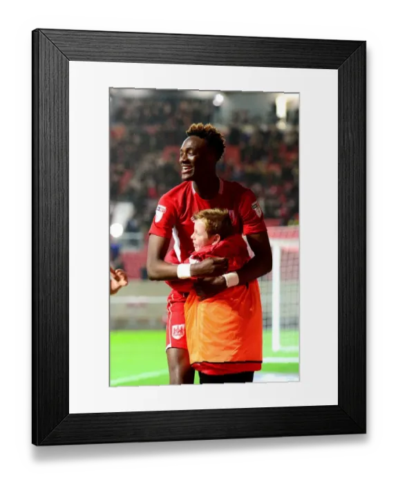 Framed Print : Tammy Abraham's Goal Celebration with a Ball Boy: Bristol City vs. Huddersfield Town, Sky Bet Championship (17 March 2017)