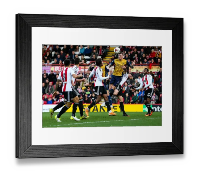 Framed Print : Aden Flint Heads the Ball: Brentford vs. Bristol City Championship Clash, 1st April 2017 Framed Print : Aden Flint Heads the Ball: Brentford vs. Bristol City Championship Clash, 1st April 2017