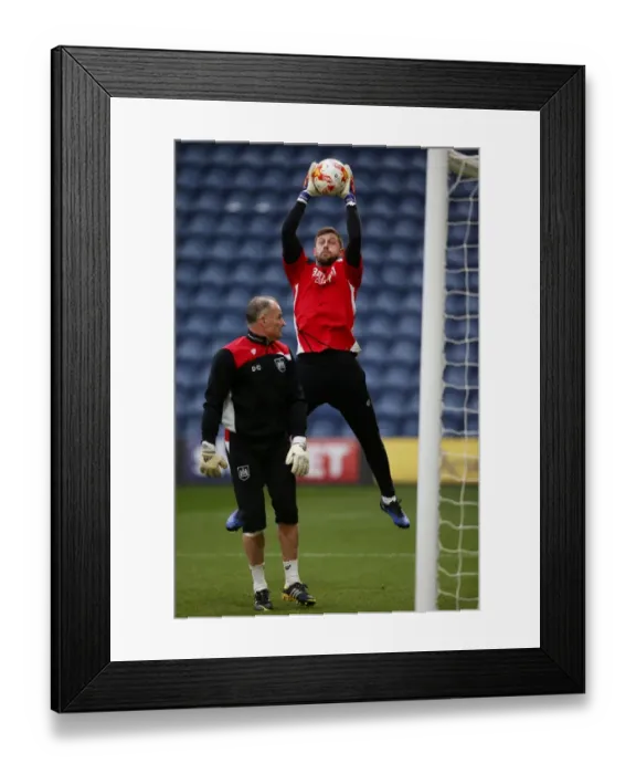 Framed Print : Bristol City's Frank Fielding and Goalkeeping Coach David Coles Warm Up Ahead of Preston North End Clash (04.04.17)